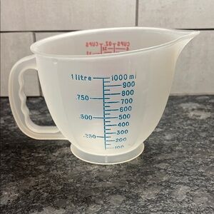 Vintage Tupperware Transparent 4 cup Measuring Cup with Blue & Red Markings